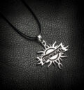 Медальон на Godsmack със слънцето