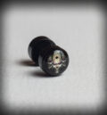 Черна обеца ухо тип флеш 1.2mm с изображение на череп