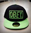 Черна мъжка шапка с права козирка OBEY с неоново зелено лого