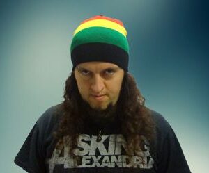 Зимна мъжка шапка Rasta в цветовете на Ямайка - червено, жълто, зелено