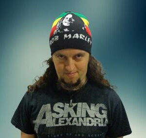 Зимна мъжка шапка Bob Marley в Rasta цветове с лика на певеца