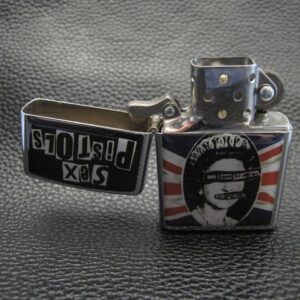 Страхотна бензинова запалка на Sex Pistols - Hover Image
