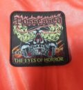 Везана нашивка на Possessed с череп и логото на бандата от албума The Eyes of Horror