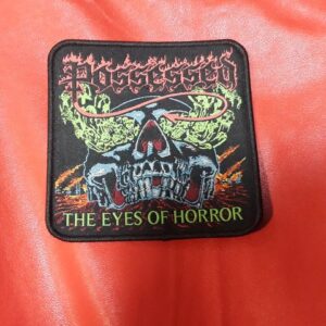 Везана нашивка на Possessed с череп и логото на бандата от албума The Eyes of Horror