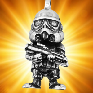 Стоманен медальон Имперски щурмовак Star Wars с бластер на златист светлинен фон