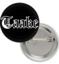 Малка значка на Taake с логото в бяло