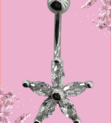 Пиърсинг за пъп от медицинска стомана с три златни кристала на черен фон