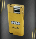 Златна запалка с логото на Audi.