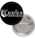 Кръгла black metal значка Taake с бяло лого на черен фон и игла за закачане